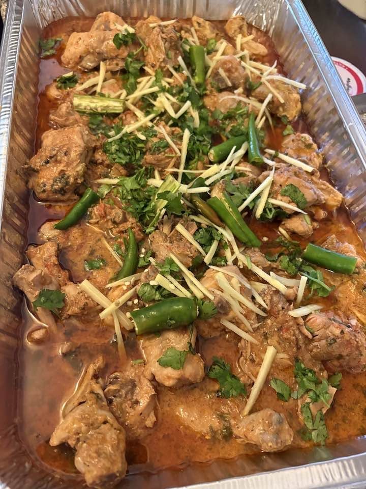 Fresh chicken karahi, packed in a catering tray
